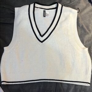 Chic White Sweater Vest with Black Trim